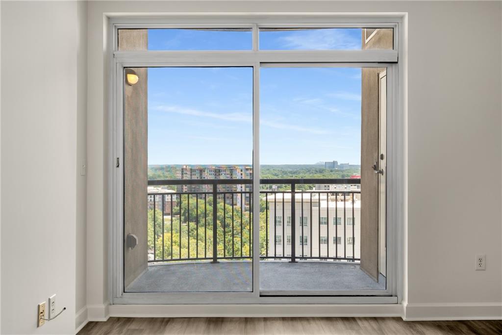 325 East Paces Ferry Road Northeast, Unit 1704 Atlanta, GA 30305 - Photo 26 of 43 a view of a balcony
