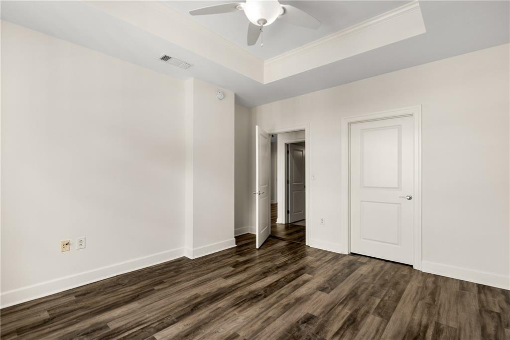 325 East Paces Ferry Road Northeast, Unit 1704 Atlanta, GA 30305 - Photo 28 of 43 wooden floor in an empty room