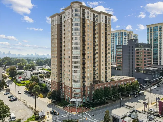 a view of a city with tall buildings