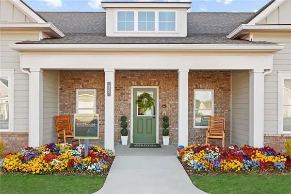 a front view of a house with an outdoor space