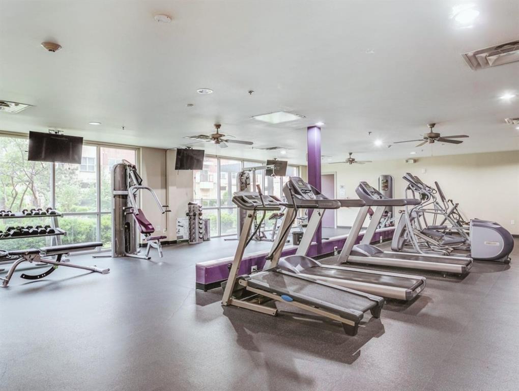 1100 West Trinity Mills Road, Unit 2001 Carrollton, TX 75006 - Photo 3 of 23 a view of a room with gym equipment