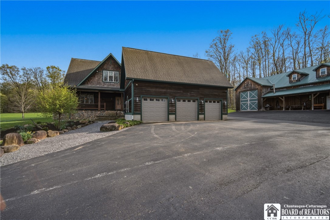 3725 Pickard Road Ellery, NY 14782 - Photo 5 of 50 3 car garage heated with pellet stove has large se
