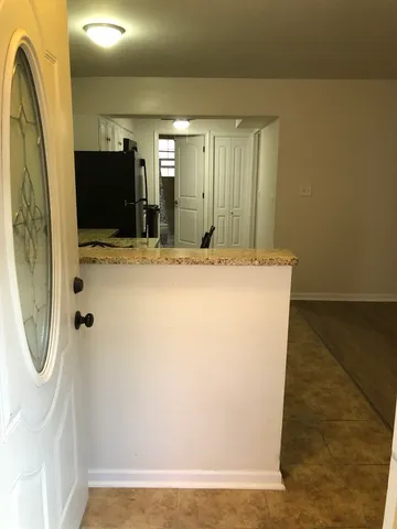 a view of a kitchen with a sink