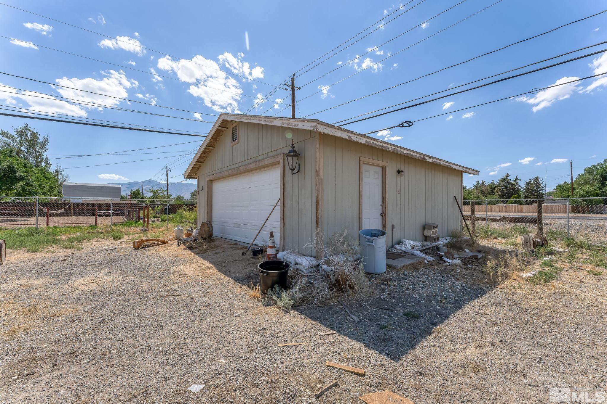 9295 Fremont Way Reno, NV 89506 - Photo 30 of 37 a backyard of a house with table and chairs