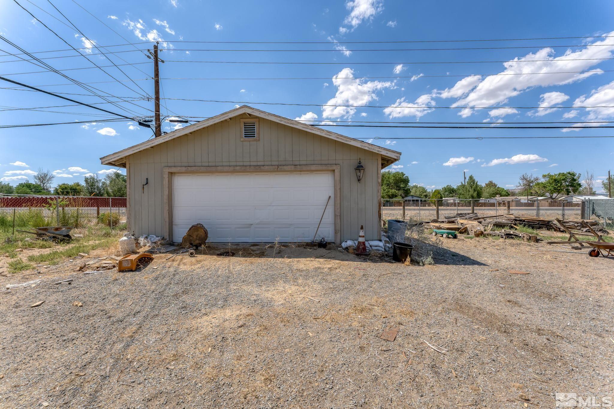 9295 Fremont Way Reno, NV 89506 - Photo 31 of 37 a view of a house with backyard and sitting area