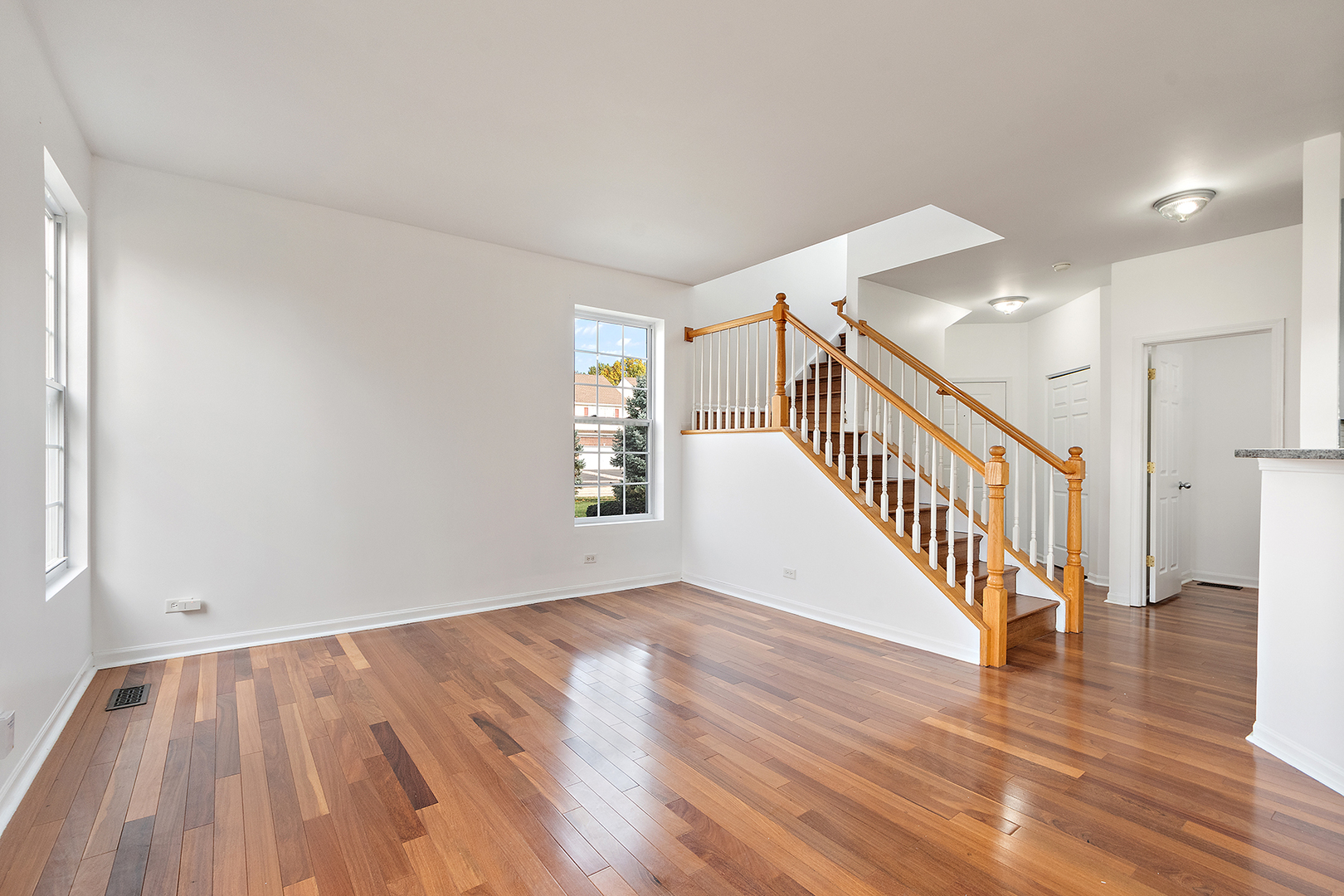 1977 Crestview Circle, Unit 1973 Romeoville, IL 60446 - Photo 11 of 19 a view of an entryway with wooden floor