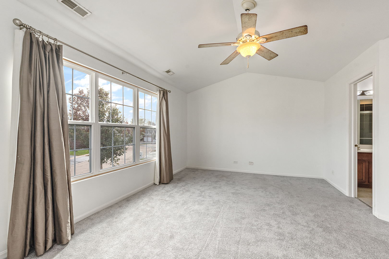 1977 Crestview Circle, Unit 1973 Romeoville, IL 60446 - Photo 17 of 19 a view of an empty room with a window