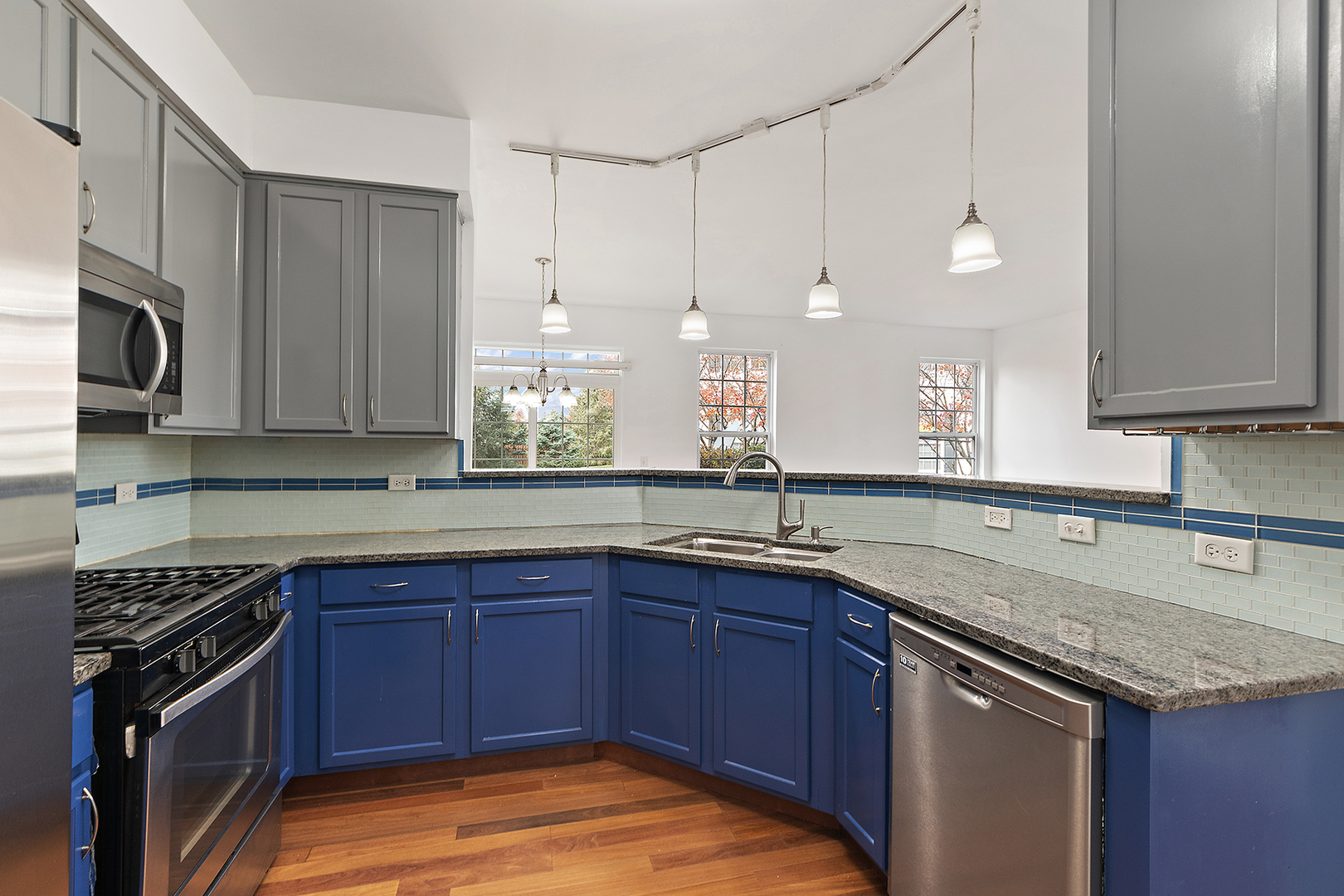 1977 Crestview Circle, Unit 1973 Romeoville, IL 60446 - Photo 7 of 19 a kitchen with a sink and cabinets