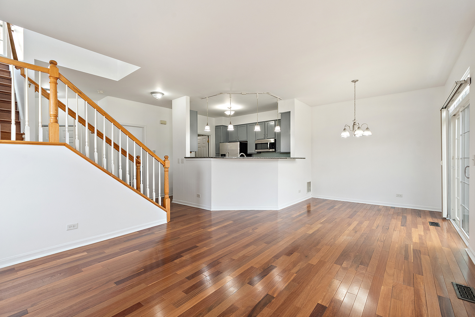 1977 Crestview Circle, Unit 1973 Romeoville, IL 60446 - Photo 9 of 19 a view of a hallway with wooden floor