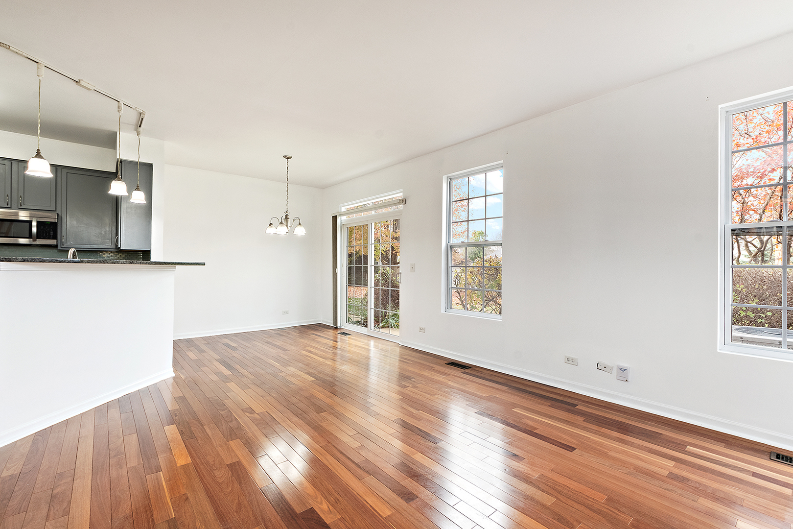 1977 Crestview Circle, Unit 1973 Romeoville, IL 60446 - Photo 10 of 19 a view of a kitchen with an empty space and a window