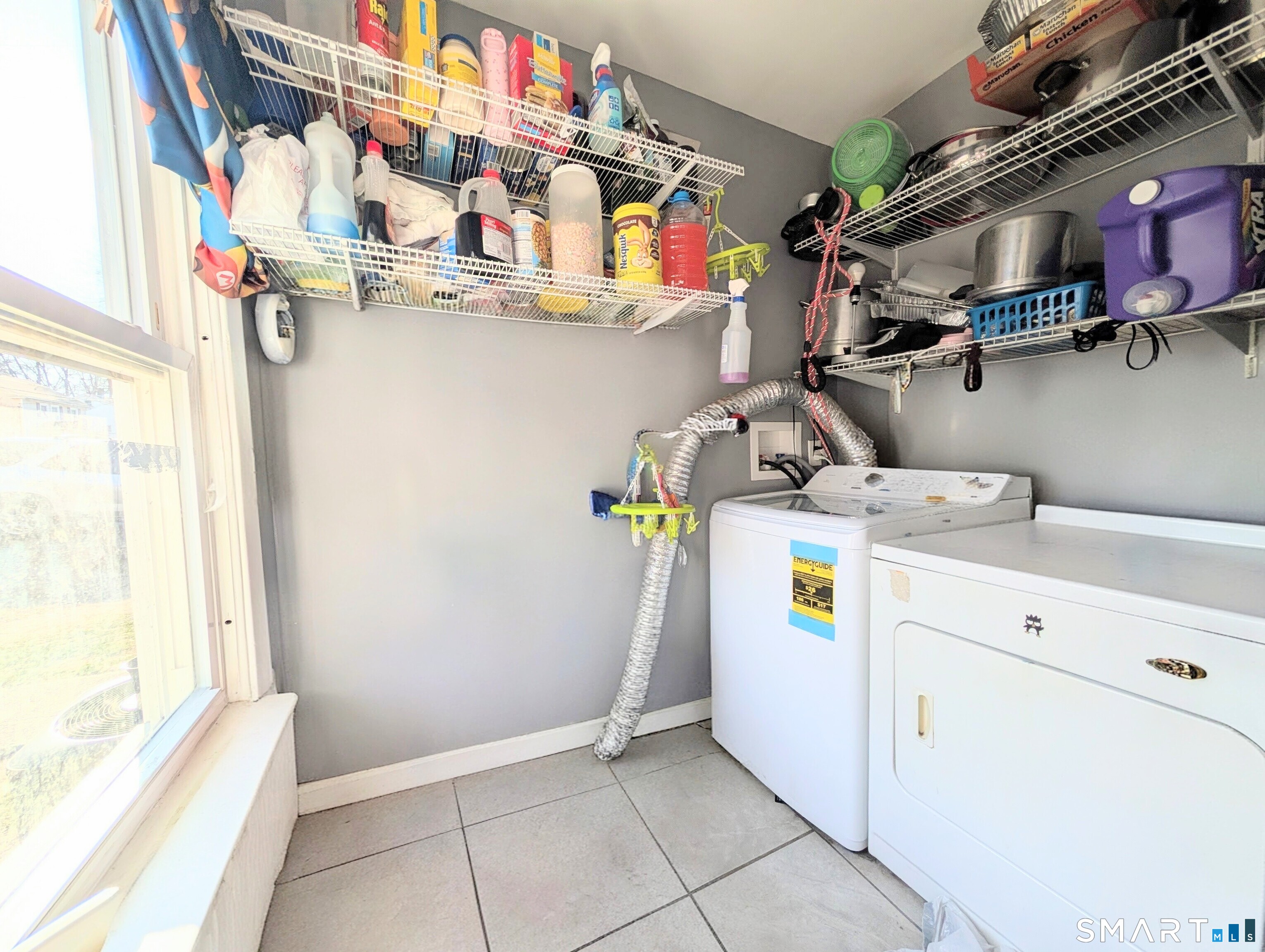 905 Cooke Street Waterbury, CT 06704 - Photo 17 of 42 a utility room with dryer and washer