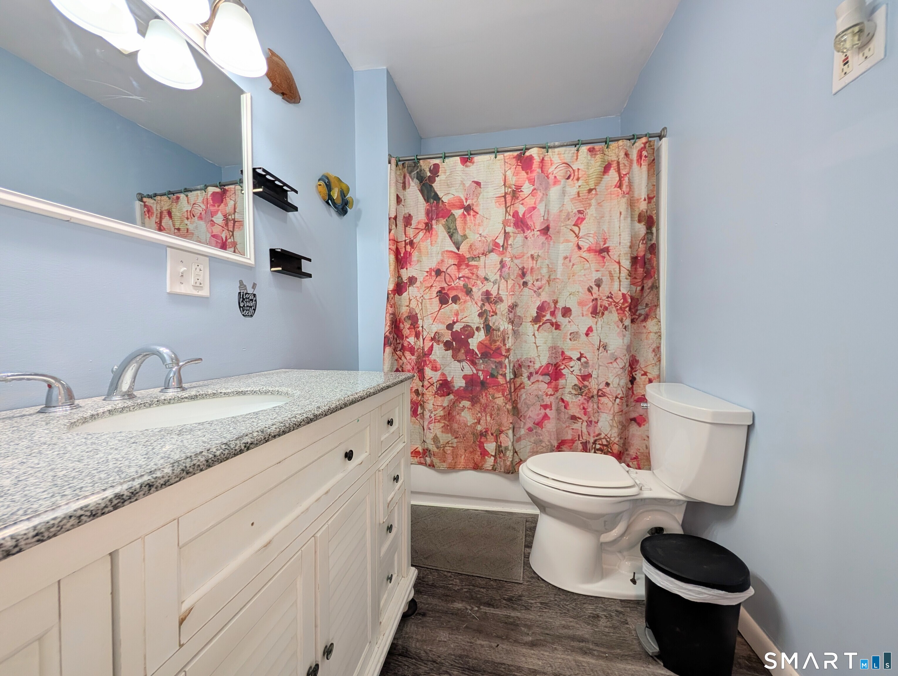 905 Cooke Street Waterbury, CT 06704 - Photo 19 of 42 a bathroom with a granite countertop toilet sink and mirror