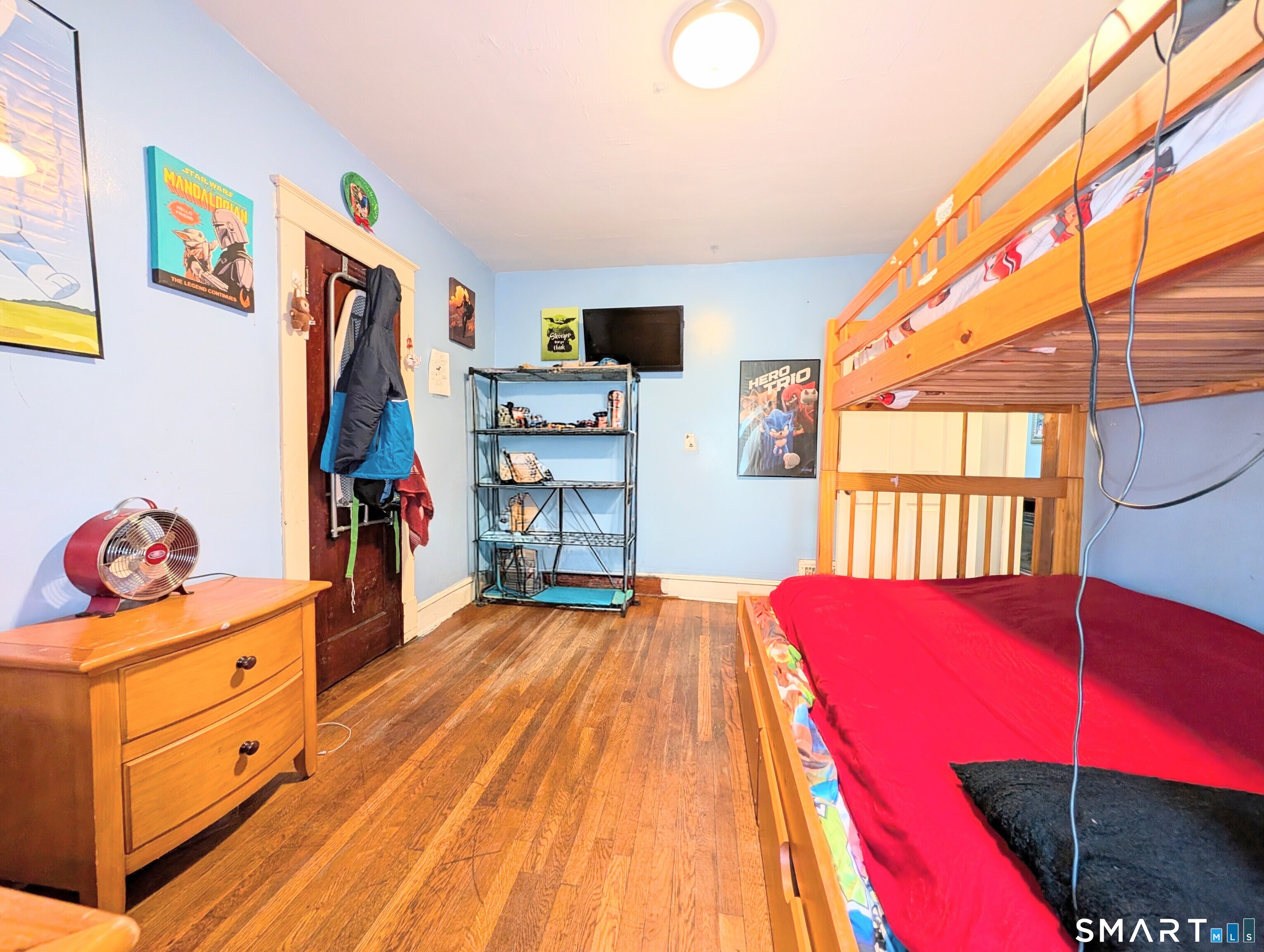 905 Cooke Street Waterbury, CT 06704 - Photo 20 of 42 a bedroom with a bed and a tv