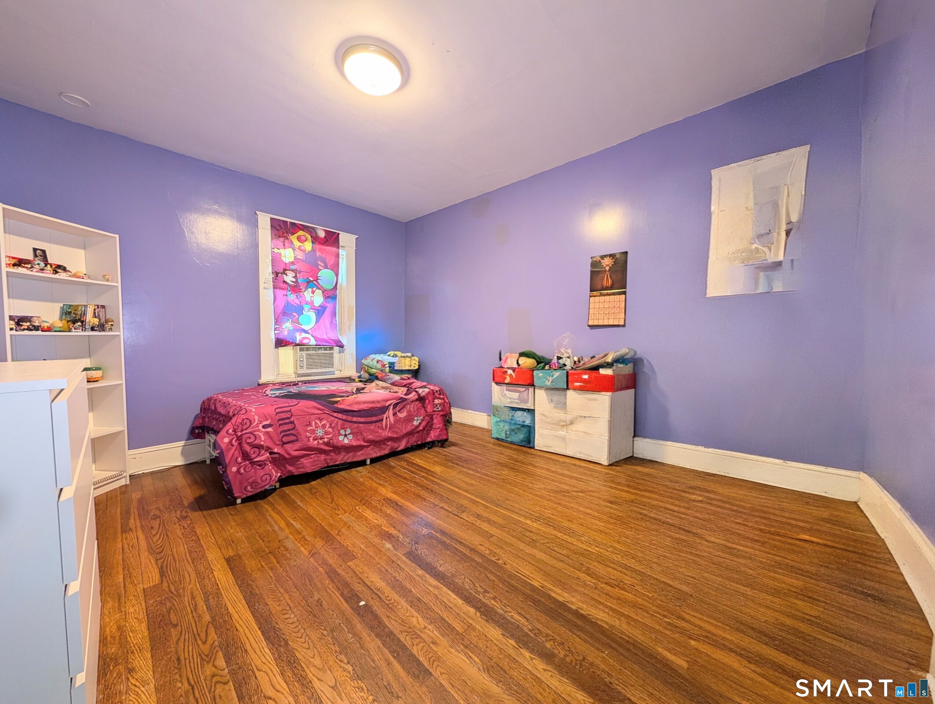 905 Cooke Street Waterbury, CT 06704 - Photo 23 of 42 a bedroom with a bed and a dresser