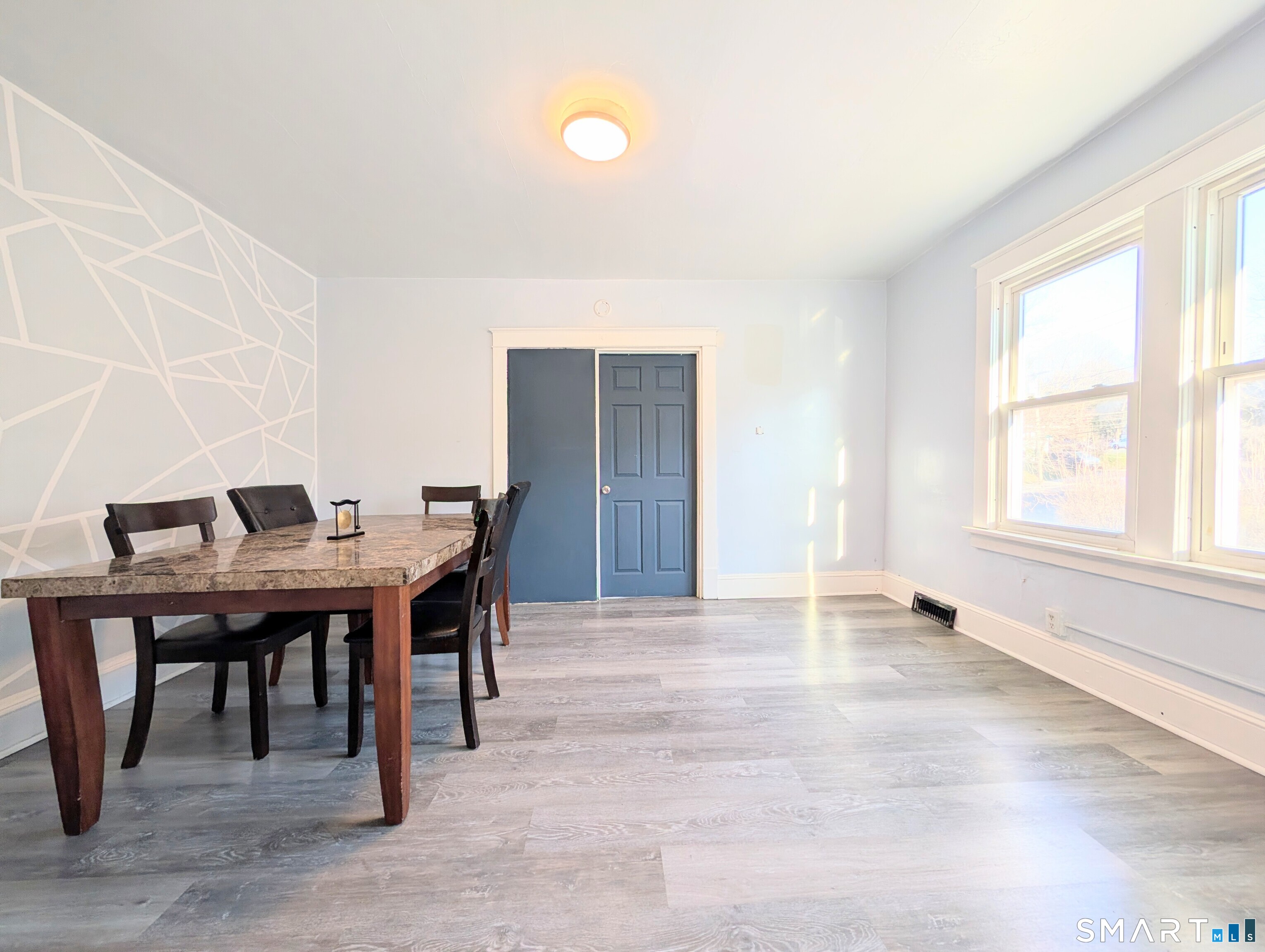 905 Cooke Street Waterbury, CT 06704 - Photo 28 of 42 a workspace with furniture and window