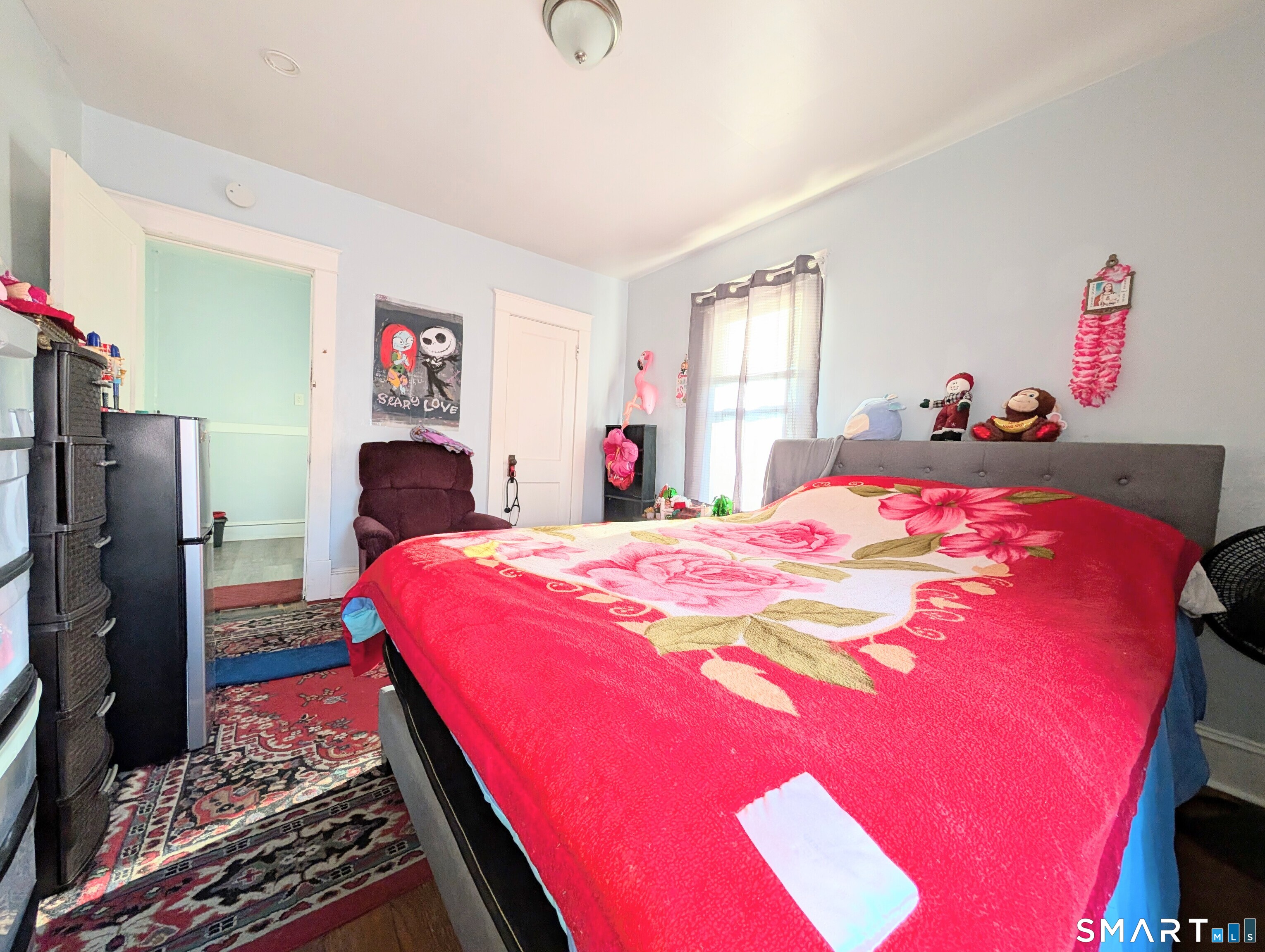 905 Cooke Street Waterbury, CT 06704 - Photo 33 of 42 a bed room with a bed and a couch