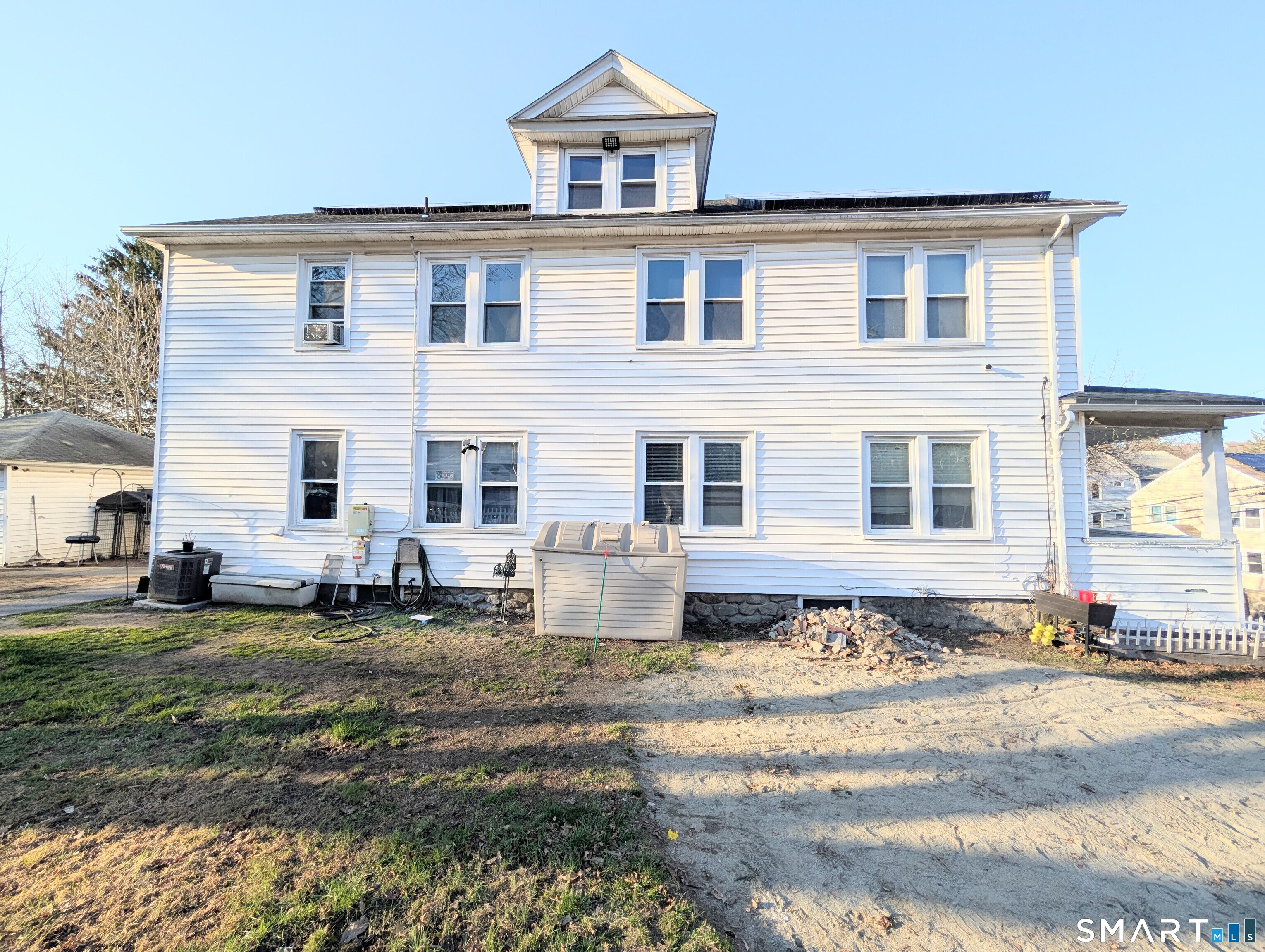 905 Cooke Street Waterbury, CT 06704 - Photo 42 of 42 a front view of a house with a yard