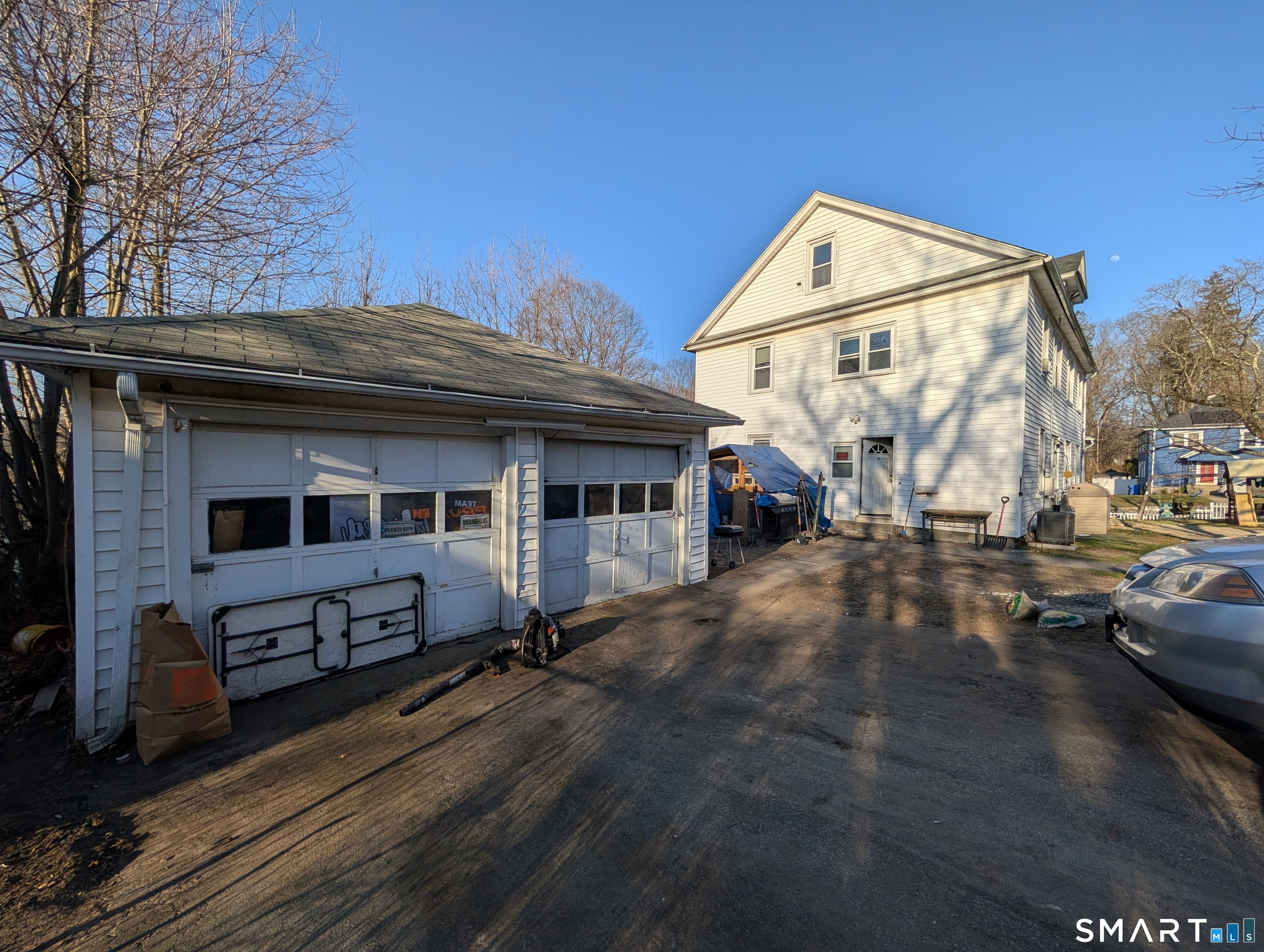 905 Cooke Street Waterbury, CT 06704 - Photo 5 of 42 a view of a house with a patio