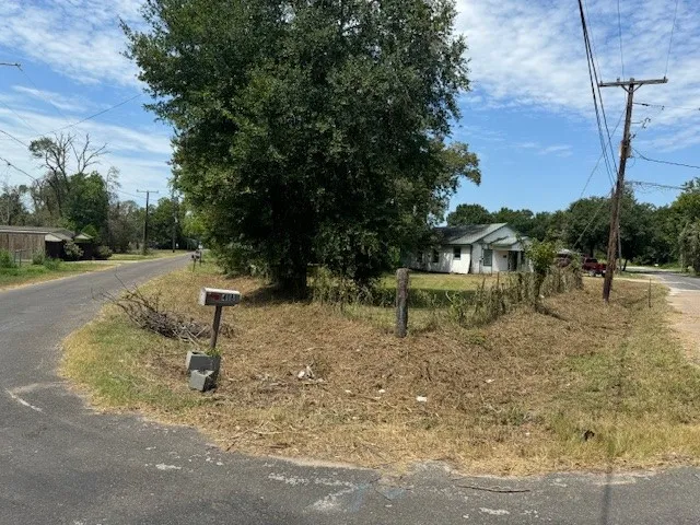 a view of a park with swings and slides