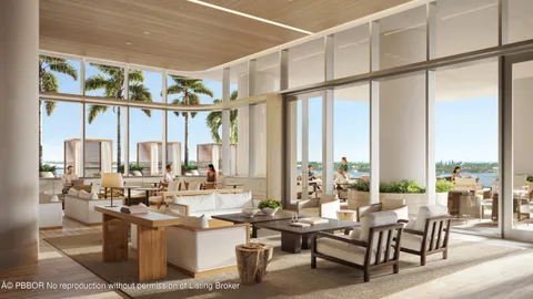 a living room with large windows and furniture