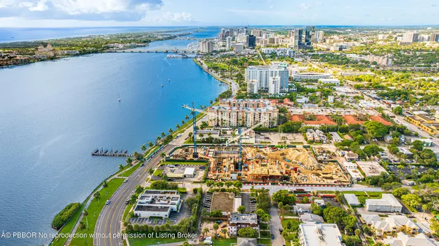 a view of a city with a lake