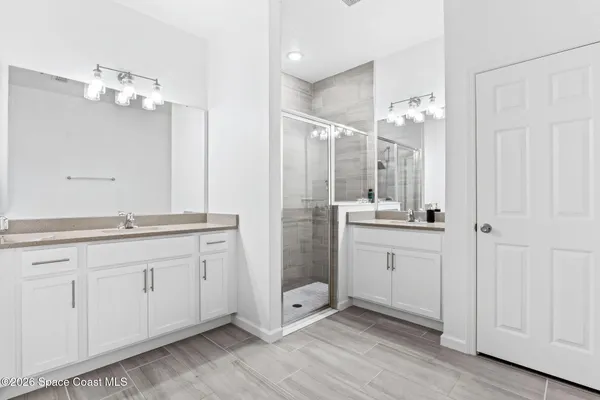 a bedroom with a bed and furniture