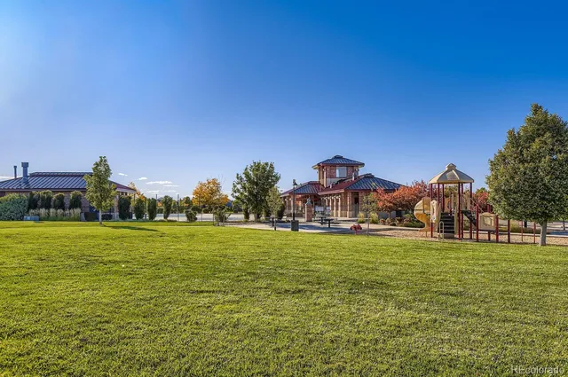 a view of a large building with a big yard