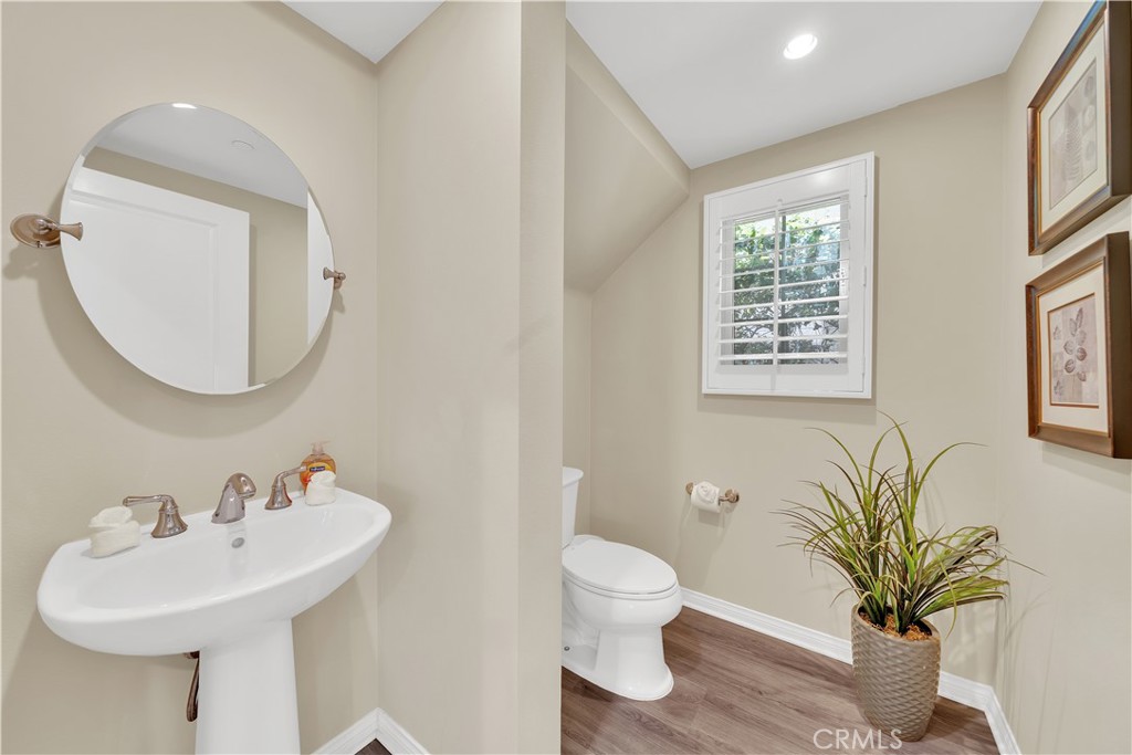 75 Gardenstone Path Irvine, CA 92620 - Photo 52 of 65 a bathroom with a sink toilet and a mirror