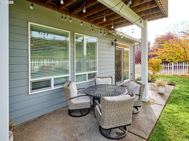 a outdoor space with patio furniture and garden