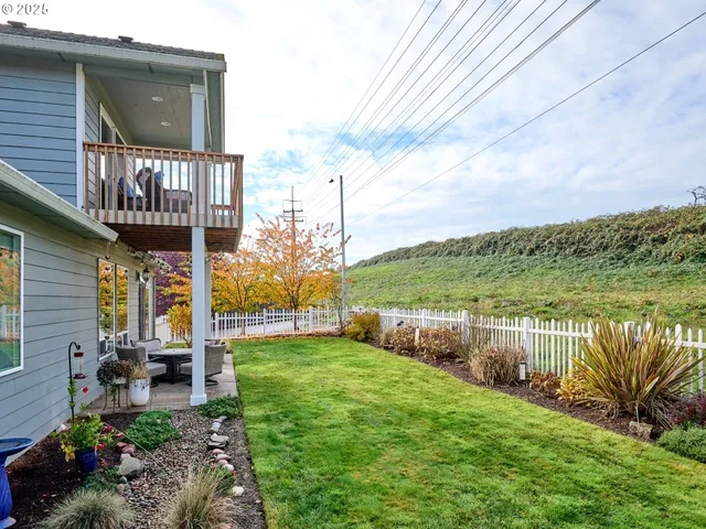 a view of a garden with patio