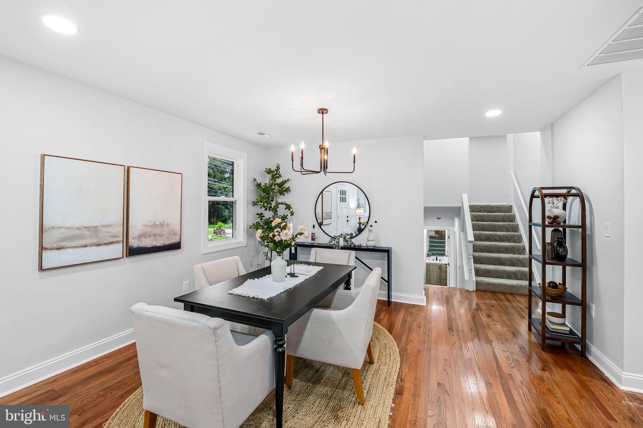6751 White Rock Road Sykesville, MD 21784 - Photo 17 of 44 a view of a livingroom with furniture and wooden floor