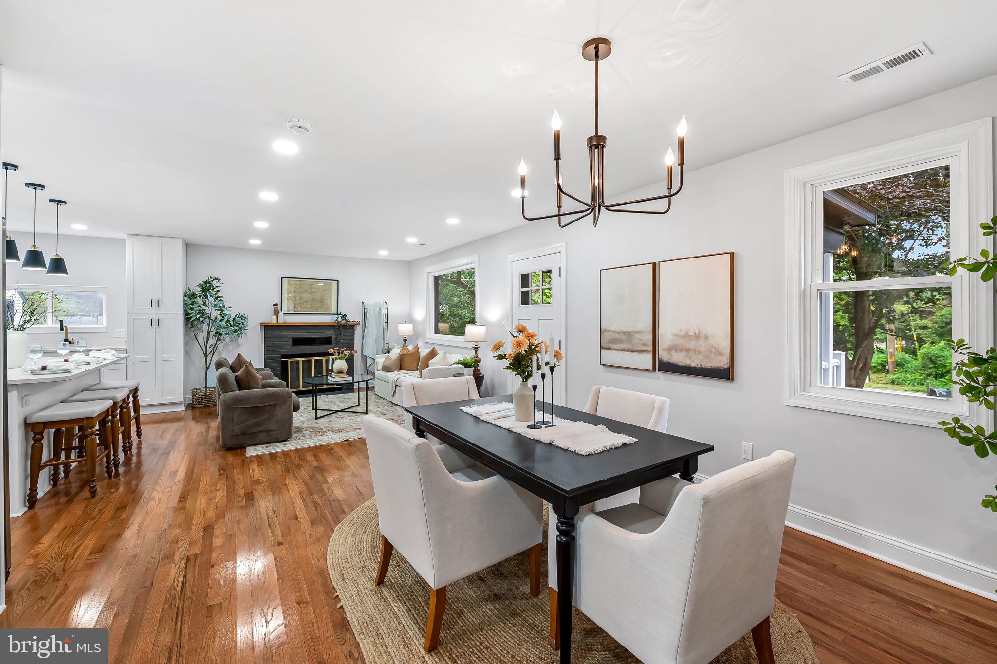 6751 White Rock Road Sykesville, MD 21784 - Photo 19 of 44 a view of a dining room with furniture window and wooden floor