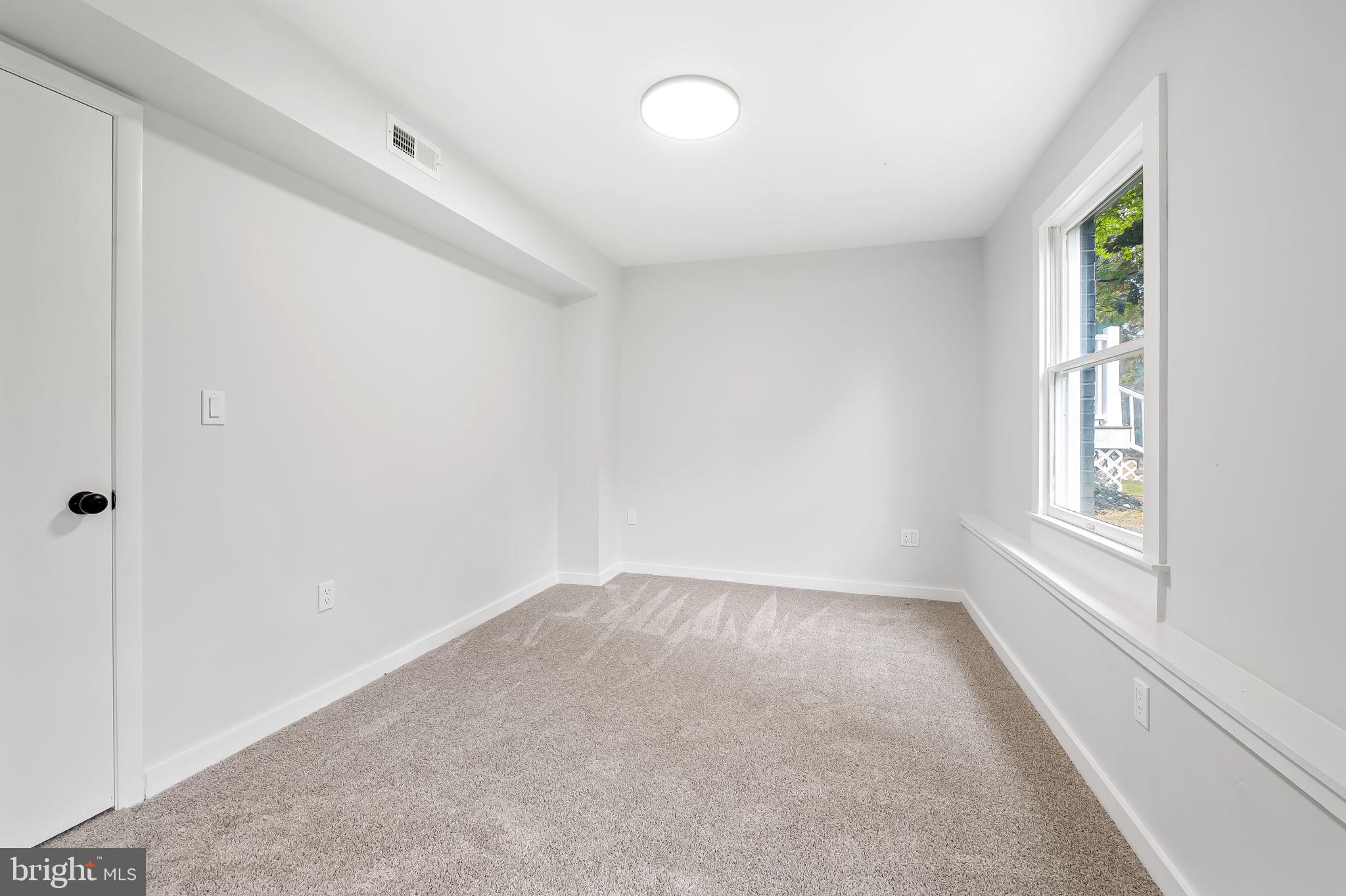 6751 White Rock Road Sykesville, MD 21784 - Photo 32 of 44 an empty room with windows
