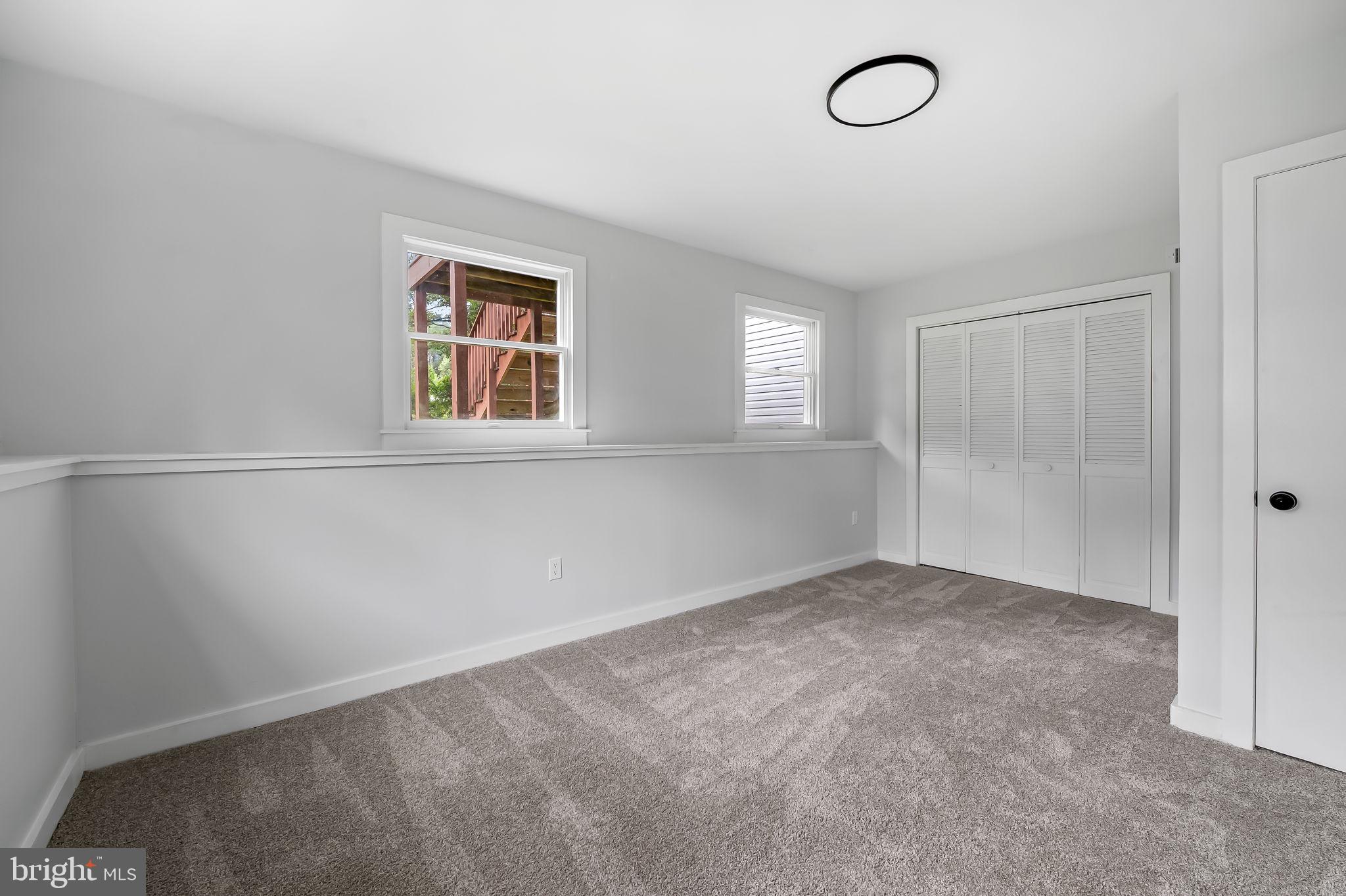 6751 White Rock Road Sykesville, MD 21784 - Photo 33 of 44 an empty room with windows and closet