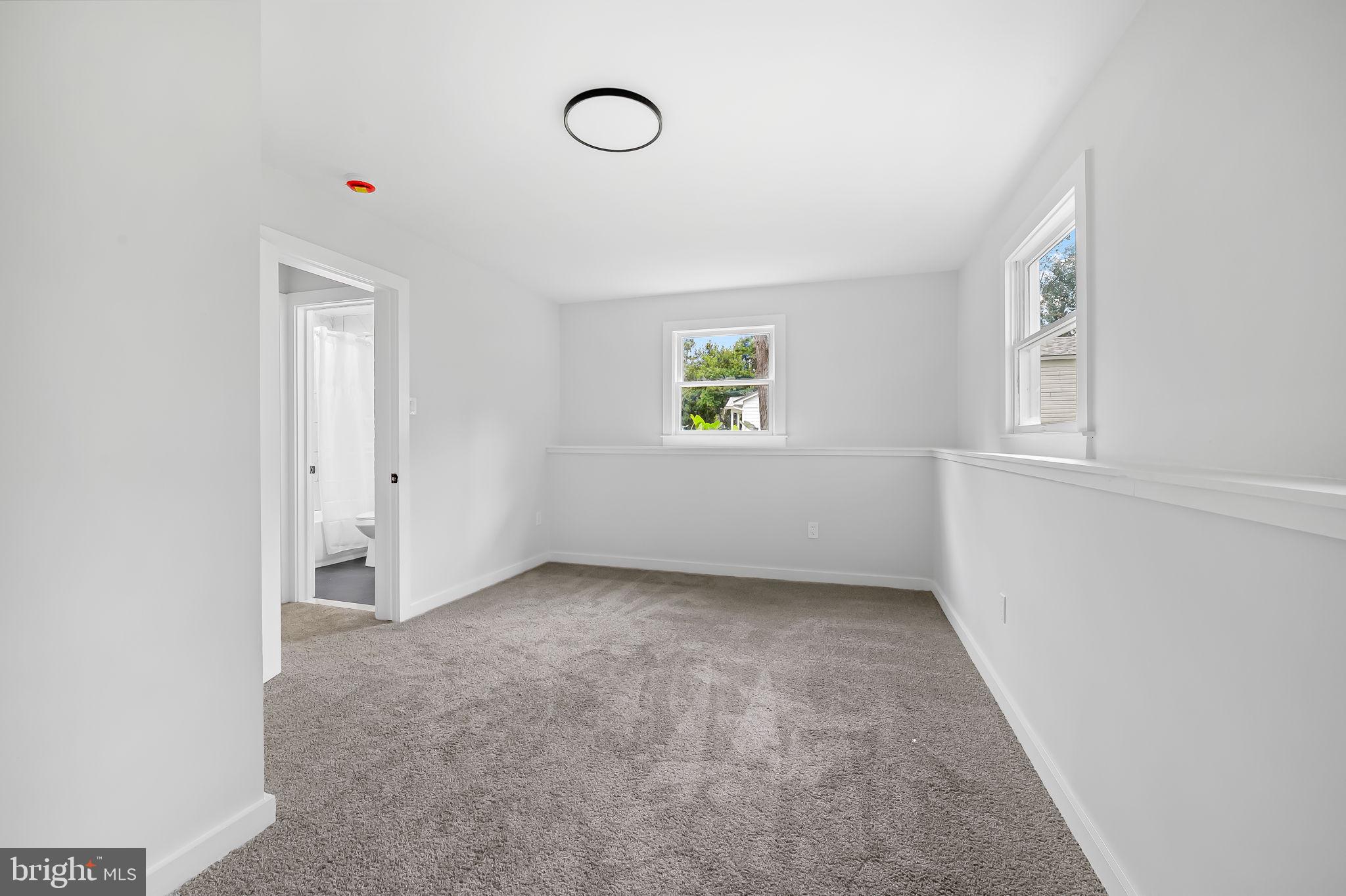 6751 White Rock Road Sykesville, MD 21784 - Photo 34 of 44 an empty room with windows