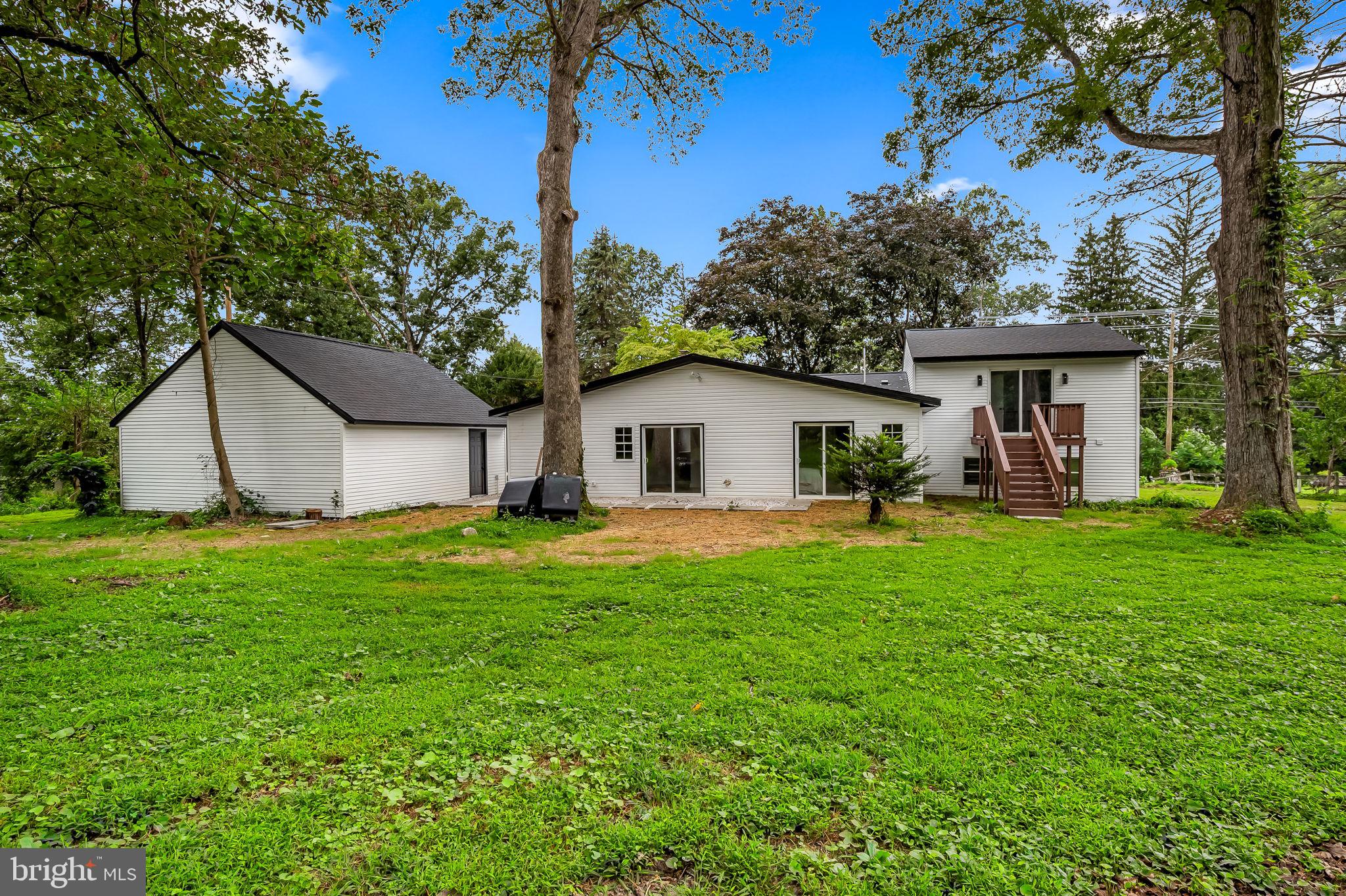 6751 White Rock Road Sykesville, MD 21784 - Photo 42 of 44 a view of a house with backyard and a sitting area