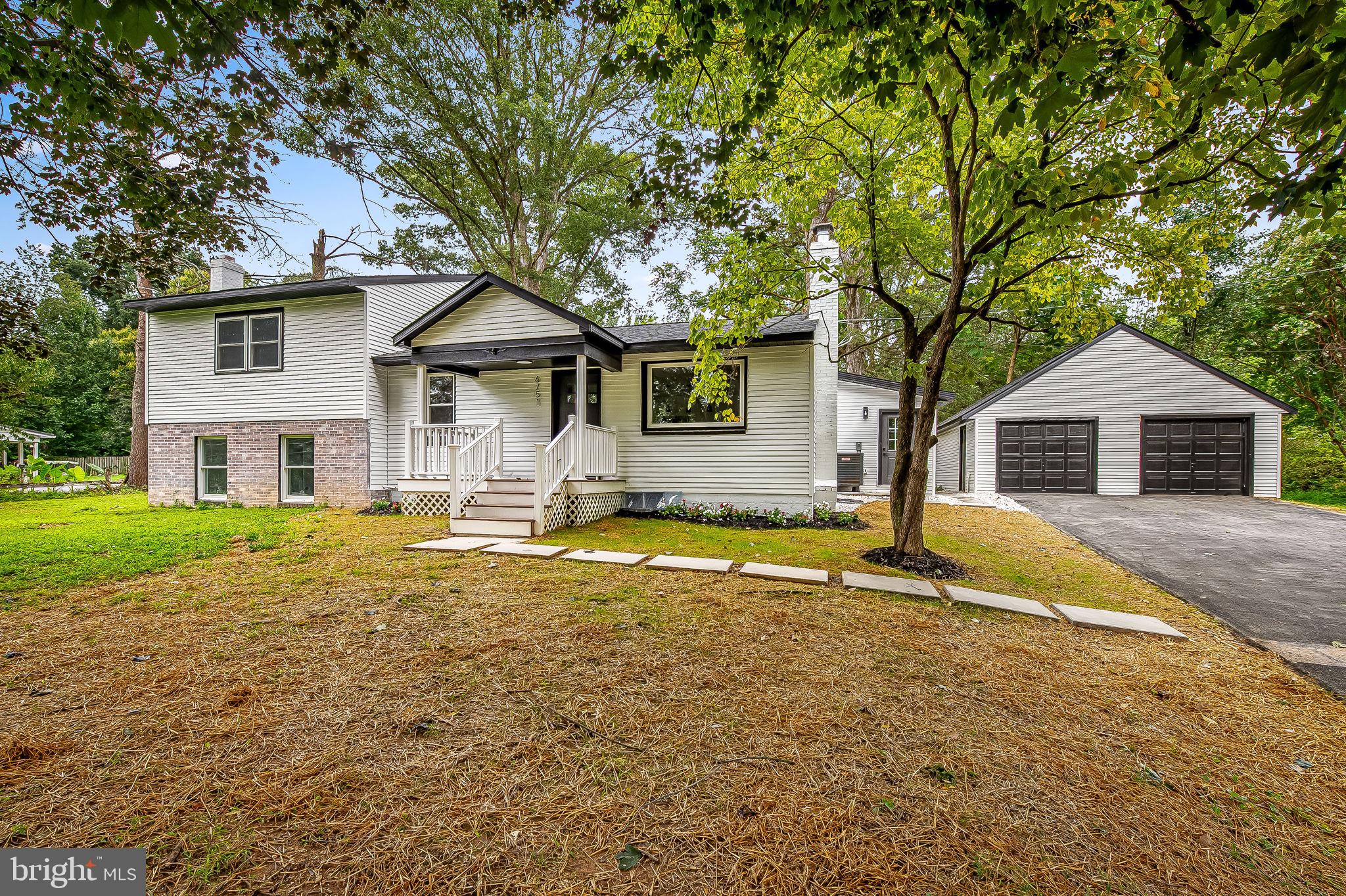 6751 White Rock Road Sykesville, MD 21784 - Photo 5 of 44 a house view with swimming pool in front of it
