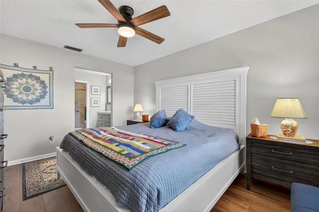 a view of a house with backyard sitting area and garden