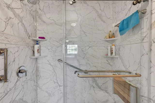 a front view of a house with outdoor seating