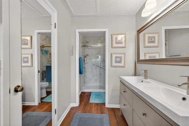 an aerial view of a houses with yard