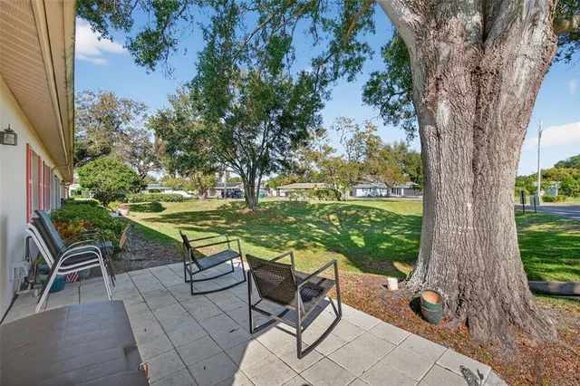 an aerial view of house with yard
