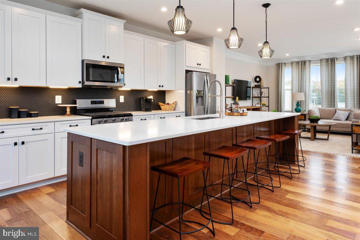 2920 Timberneck Way Hanover, MD 21076 - Photo 12 of 52 Upgraded Kitchen staged on Wood Floors
