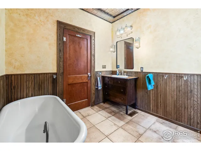 a living room with a sink furniture and a window