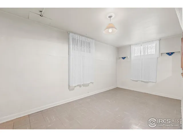 an empty room with an entryway