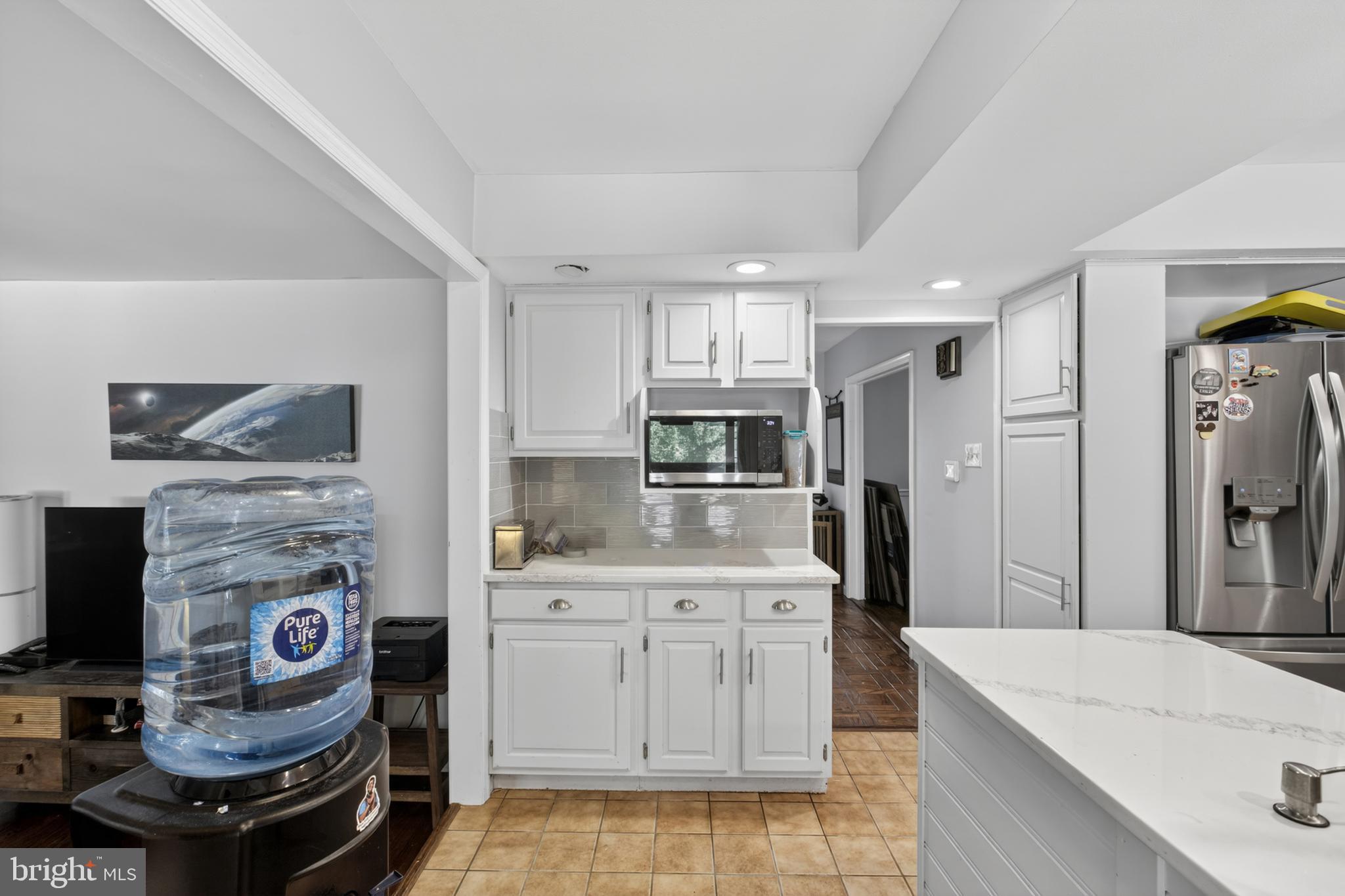 216 Revere Road Marlton, NJ 08053 - Photo 14 of 47 a kitchen with stainless steel appliances kitchen island granite countertop a sink stove and refrigerator
