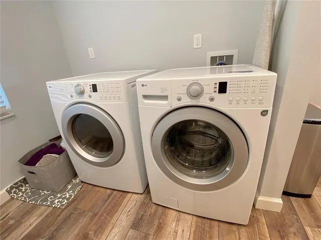 a utility room with dryer and washer