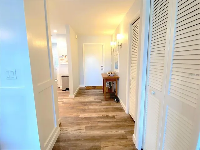 a view of a bathroom from the hallway