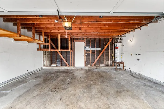 a bathroom with a toilet a sink and a mirror