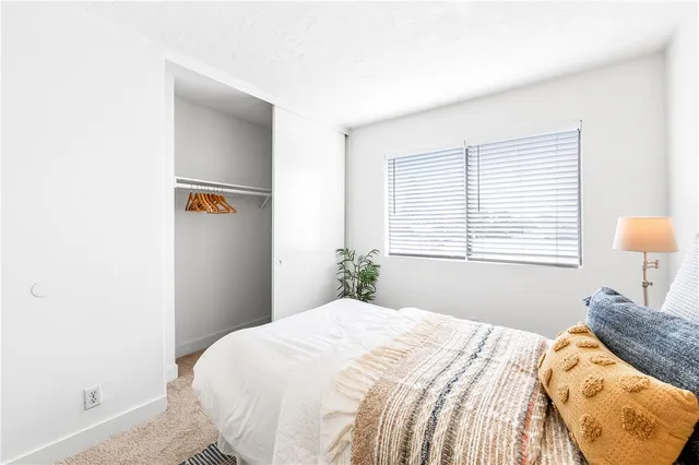 a view of house with swimming pool yard and outdoor seating