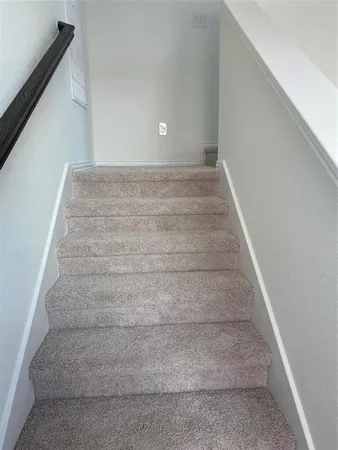a white bath tub sitting next to a white toilet